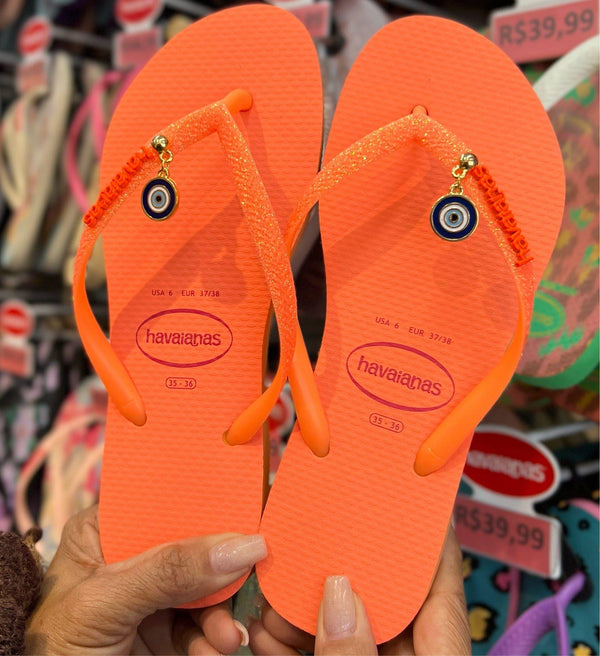 Havaianas Slim Glitter Neon + Pingente Olho Grego